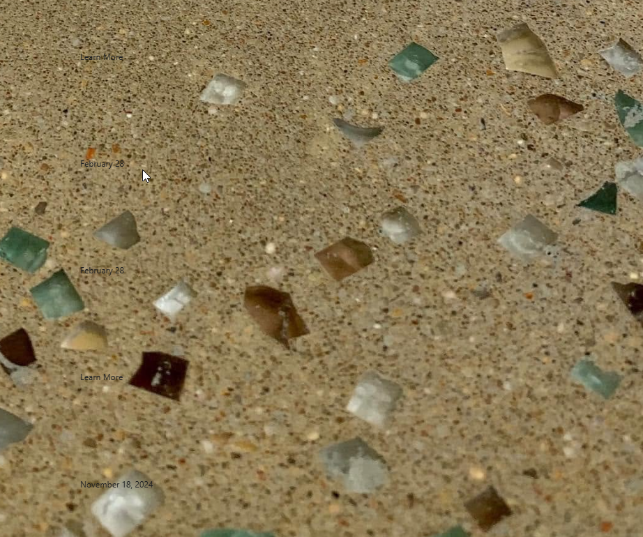 Polished concrete floor seeded with glass aggregate in a terrazzo-style finish